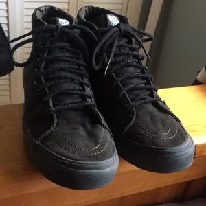 All black high top vans
